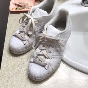 All white adidas superstars